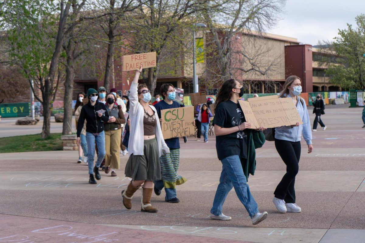 Protestors march with signs demanding for a ceasefire in Gaza outside the Lory Student Center Plaza during a Students for Justice in Palestine protest on May 1. The protest included chanting and marching in support of Palestine  The protest included chanting and marching in support of Palestinians and demanded Colorado State University calls for a ceasefire in Gaza.