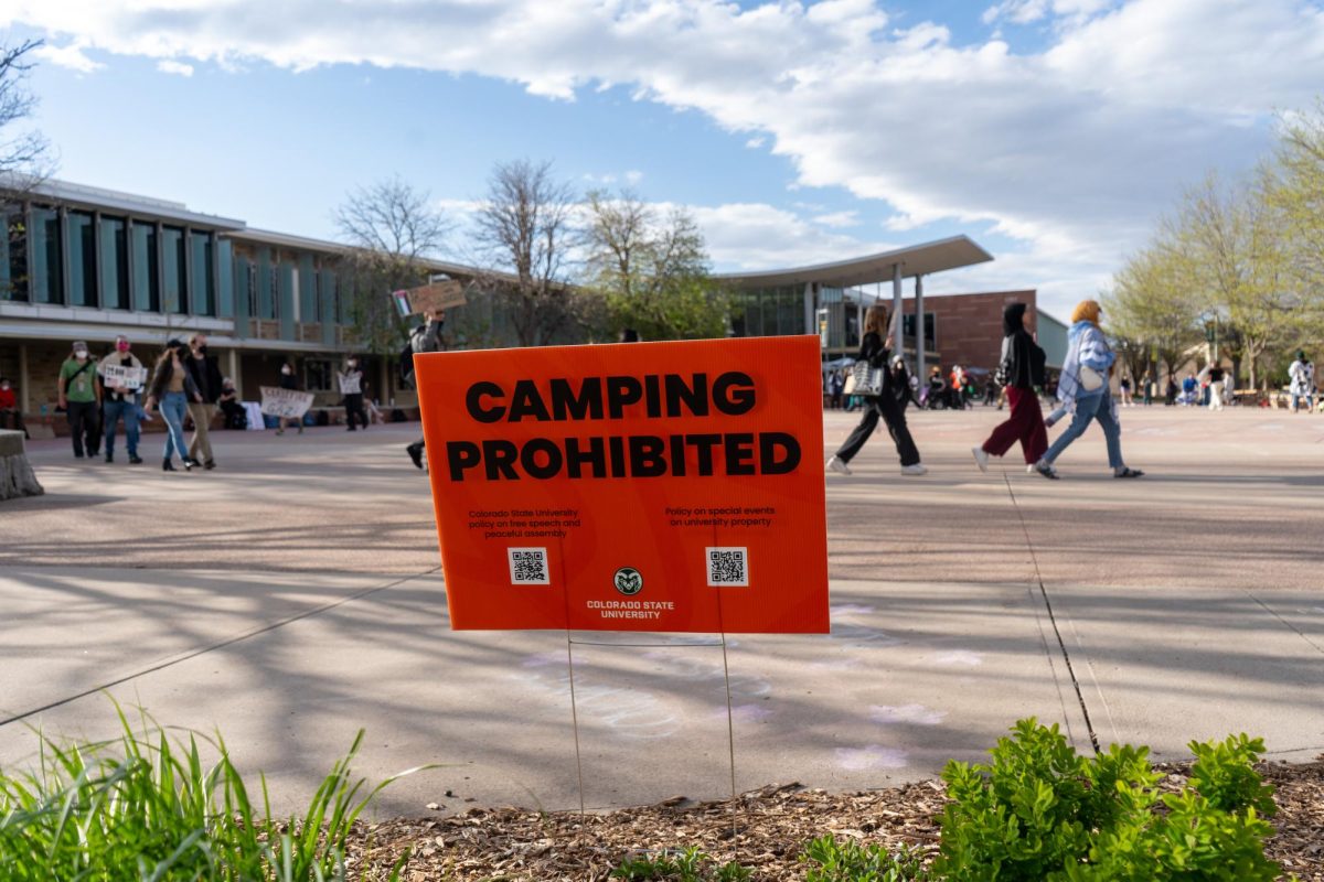 A sign alerting that camping is prohibited on Colorado State Universitys campus sits on the Lory Student Center Plaza on May 1. The demonstration by Students for Justice in Palestine on the LSC plaza ended at 7 p.m. in accordance with university policy. 