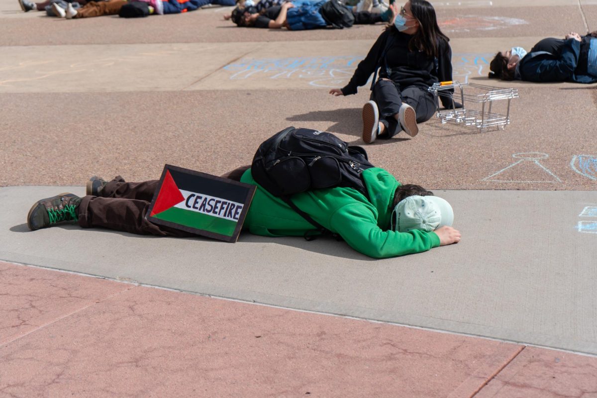 Protestors gather outside the Lory Student Center Plaza during a Students for Justice in Palestine protest on May 1. The protest included chanting and marching in support of Palestine. The protest included a die-in demonstration. 