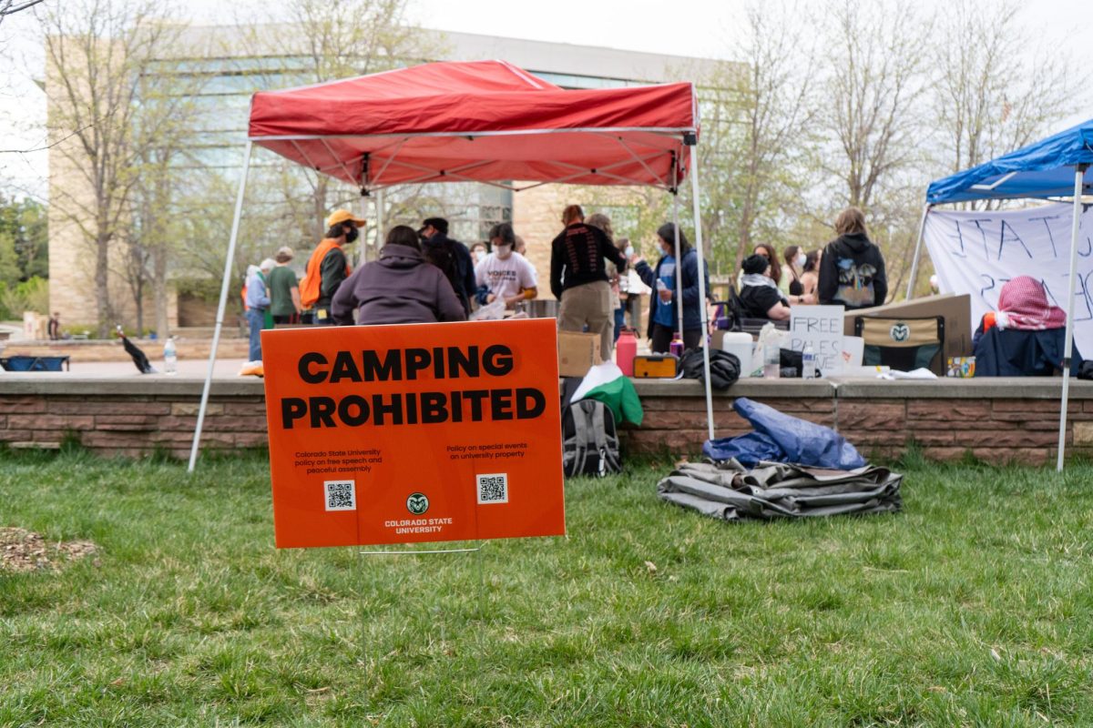 A sign alerting that camping is prohibited on Colorado State Universitys campus sits on the Lory Student Center Plaza May 1. The demonstration by SJP ended 7 p.m. to not illegally camp on The Plaza.