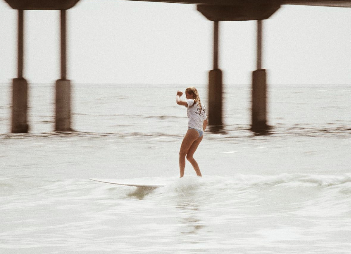Girls Long boarding at Sun Diego’s AM Slam surf competition in Ocean Beach, California. 