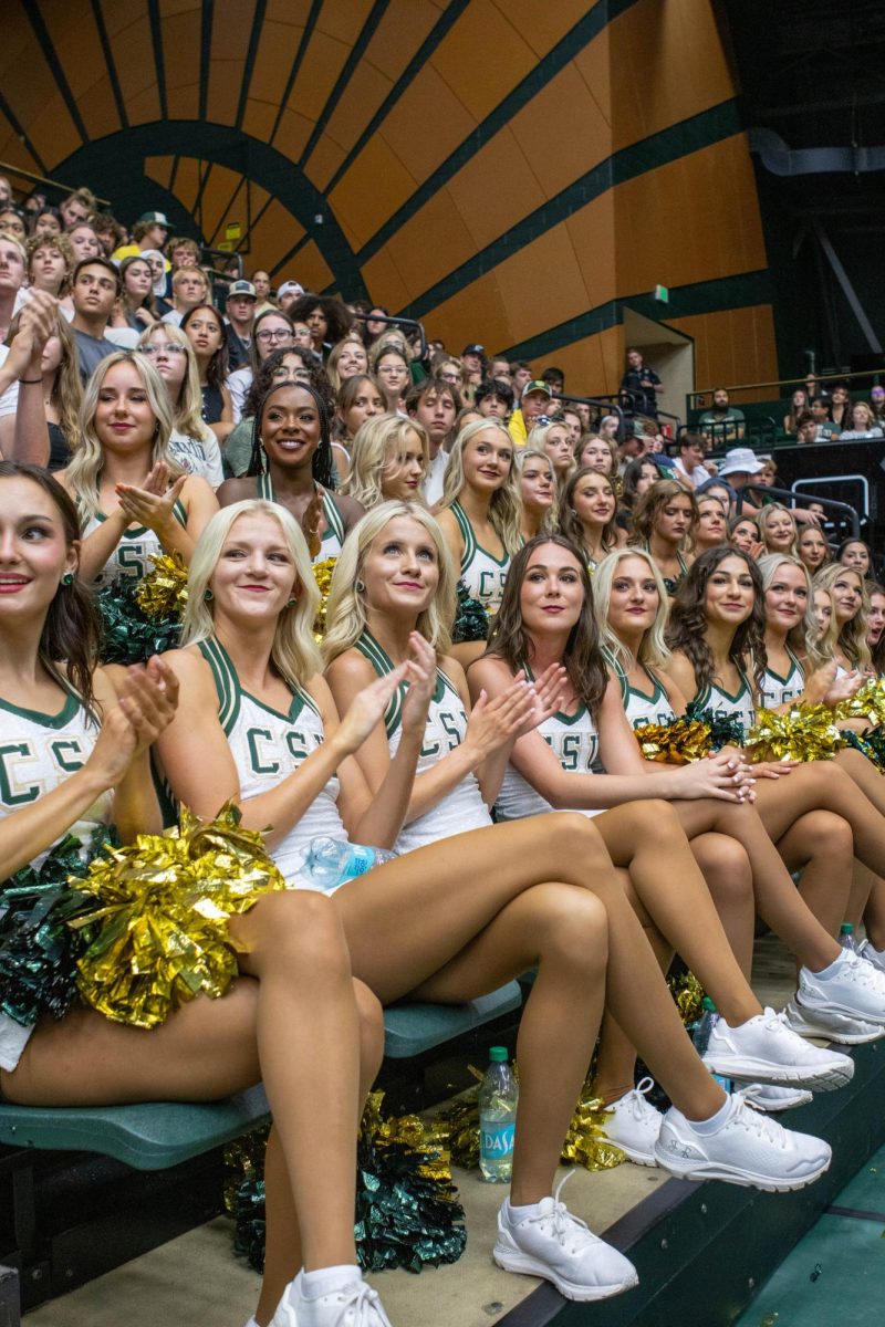 Colorado State University Golden Poms clap for the speakers at the class of 2028's convocation. Aug. 16.