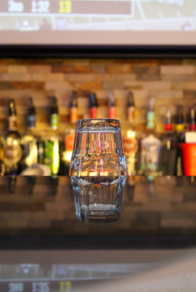 An empty glass sits upside down on the bar at Yeti Bar and Grill Sept. 28.