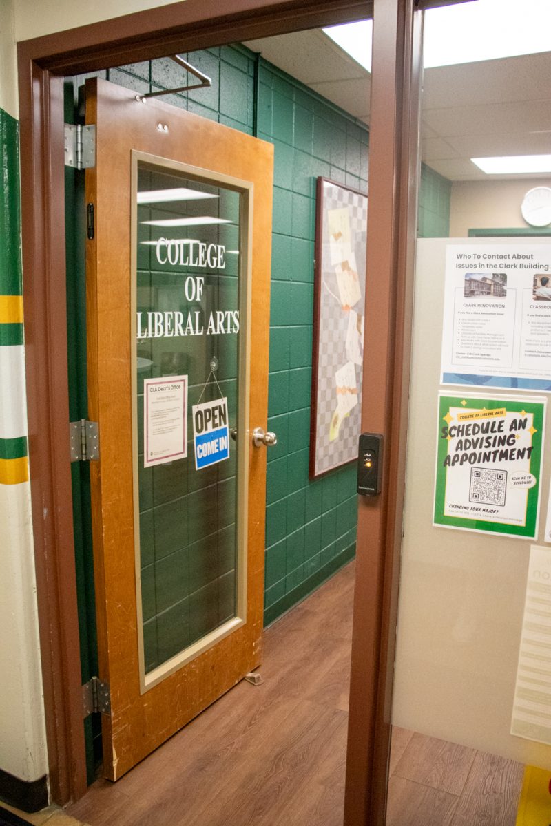 An open door that says "College of Liberal Arts" on it.