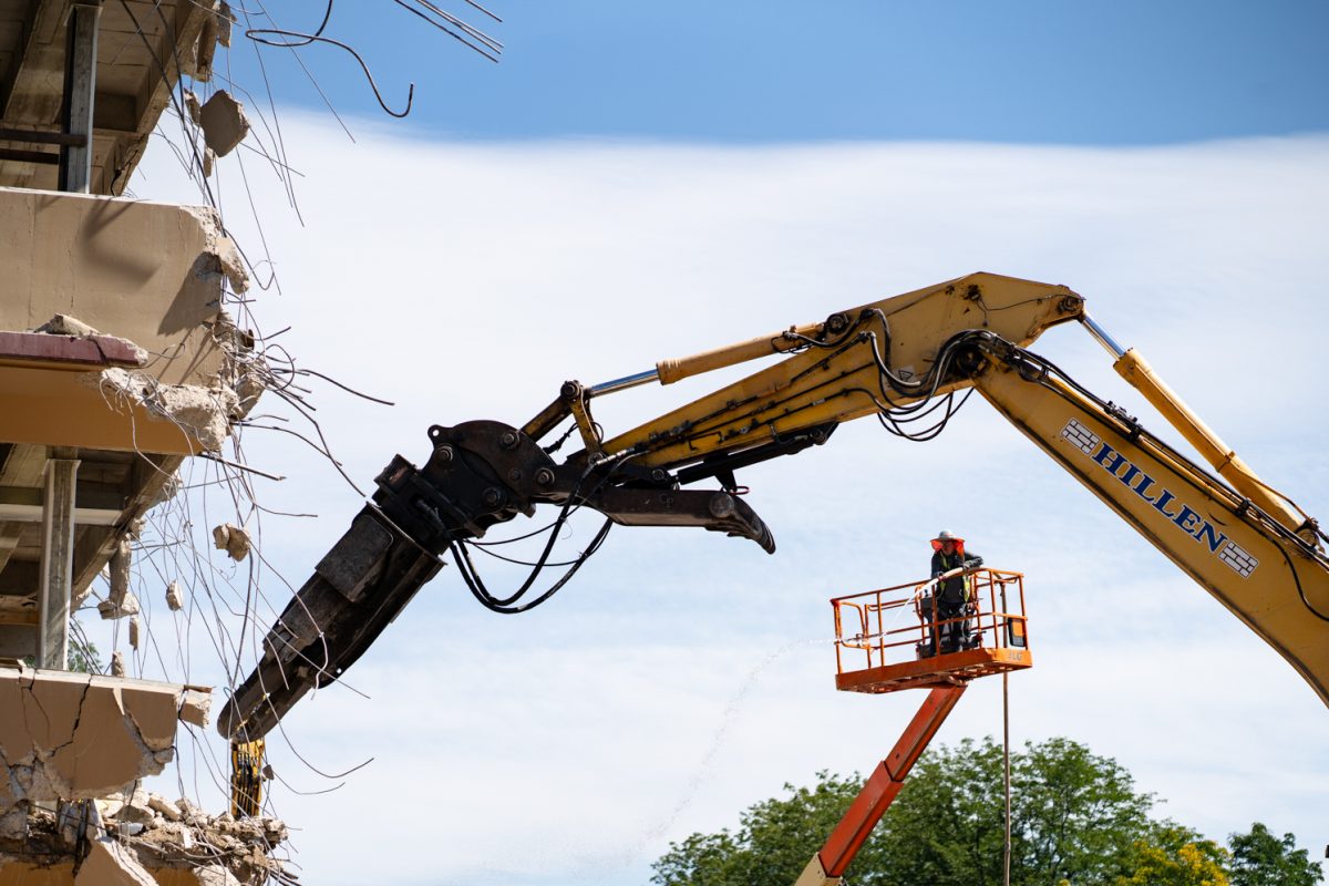 A material handling excavator removes debris from Clark B during demolition Sept. 12. The renovations, set to be complete by 2027, have seen the removal of the B wing of Clark. 