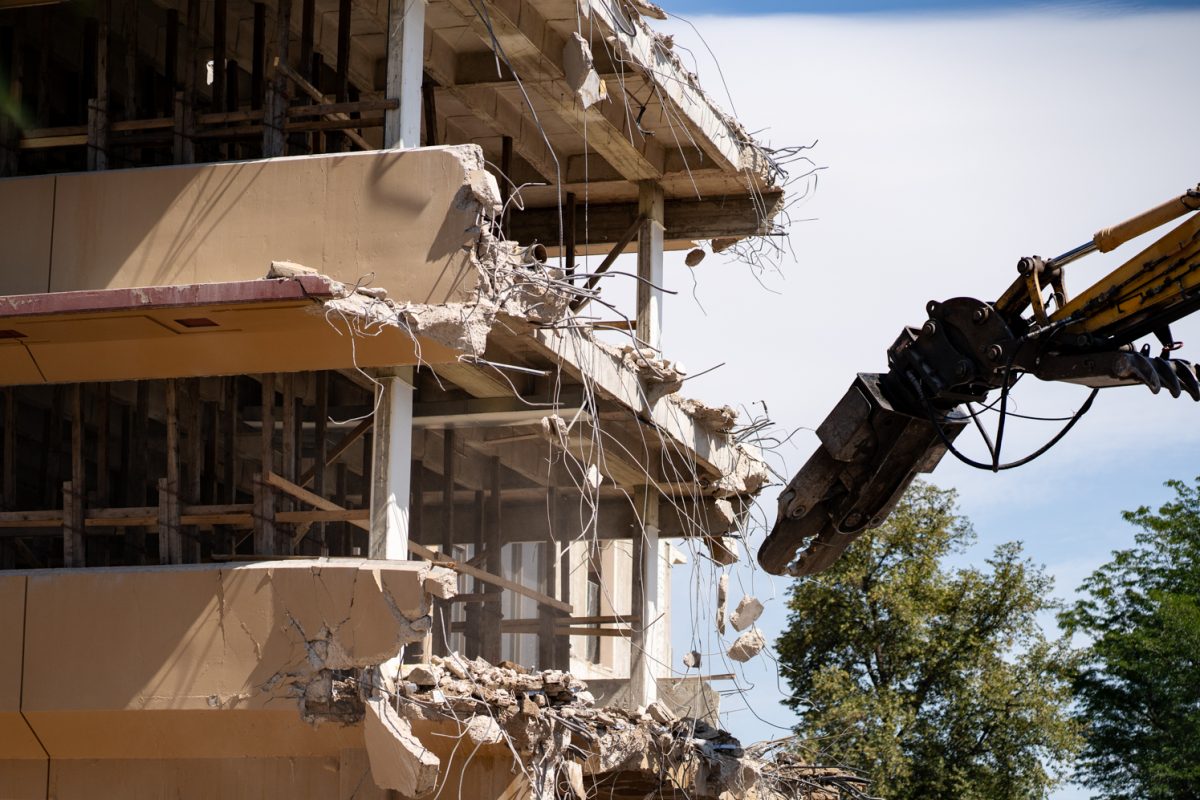 A material handling excavator removes debris from Clark B during demolition Sept. 12. The renovations, set to be complete by 2027, have seen the removal of the B wing of Clark. 