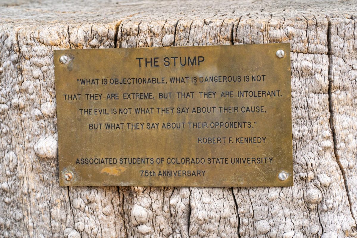 The plaque of text dedicating The Stump to being the designated free speech location at Colorado State University on Sept. 11. The Stump is symbolic for being an allowed freedom of expression zone. 