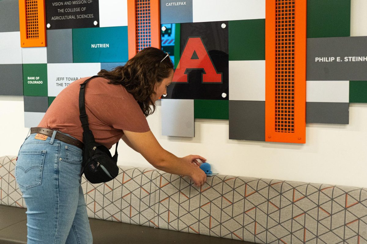 M.M, the Director of Octopi Operations for Octopi of CSU hides an octopi in the Nutrien Agricultural Sciences Building Sept. 17. M.M and the rest of the group are anonymous to preserve the integrity and mystery of the group, which focuses on random acts of kindness around campus. 