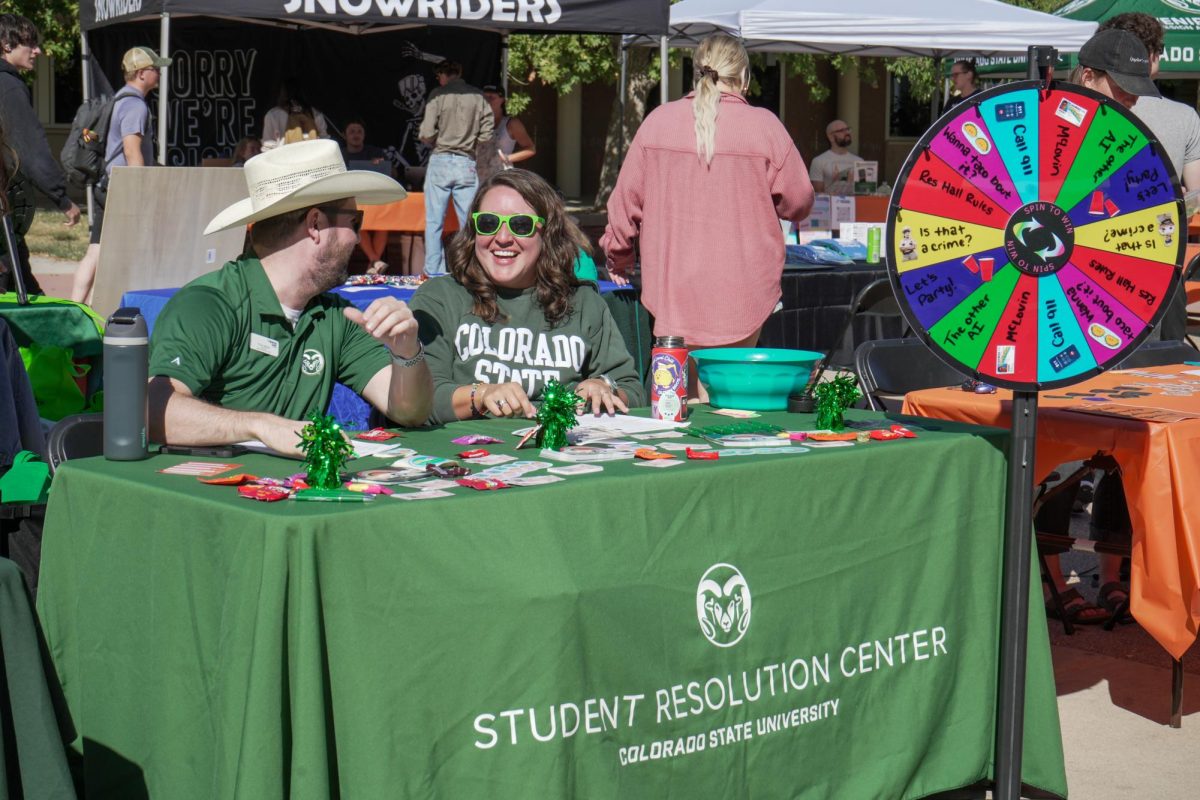 Chris Miller and Alejandra Sullivan, representatives of the Student Resolution Center, table at Wellness Wonderland on The Plaza on Sept. 20. The event, hosted by the Associated Students of Colorado State University's Department of Basic Needs, featured resources for physical and mental wellbeing. 