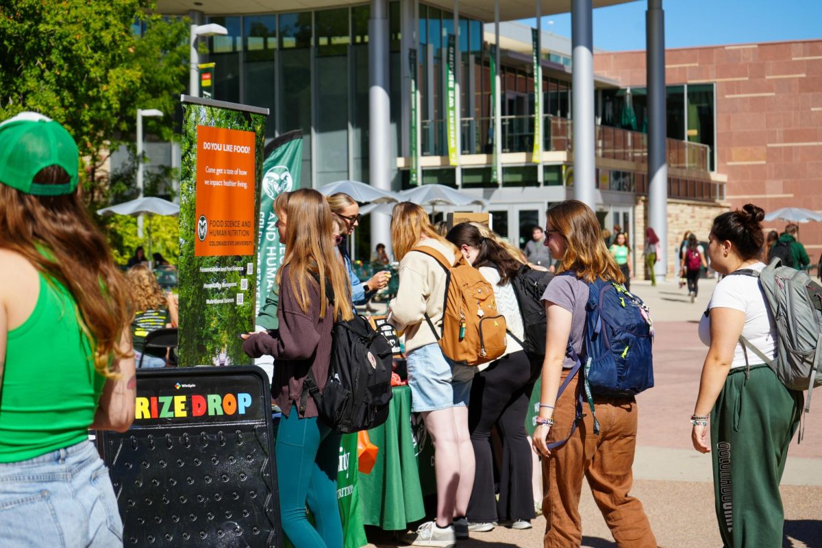 Students attend the Wellness Wonderland event on The Plaza Sept. 20. The event featured various campus organizations tabling to provide physical and mental wellbeing resources for students. 