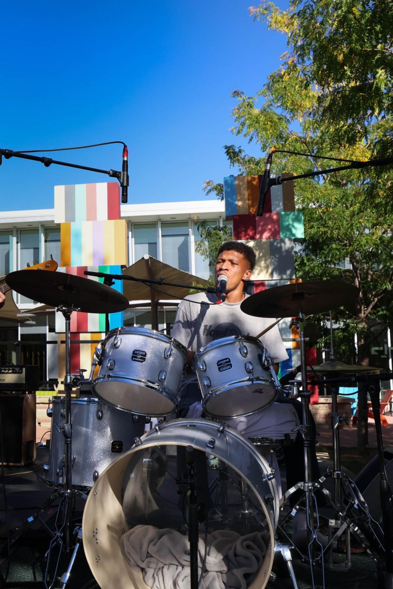 Jordan Upton sings and well as plays drums for local Fort Collins band State Line during Battle of the Bands on Sep. 19. 