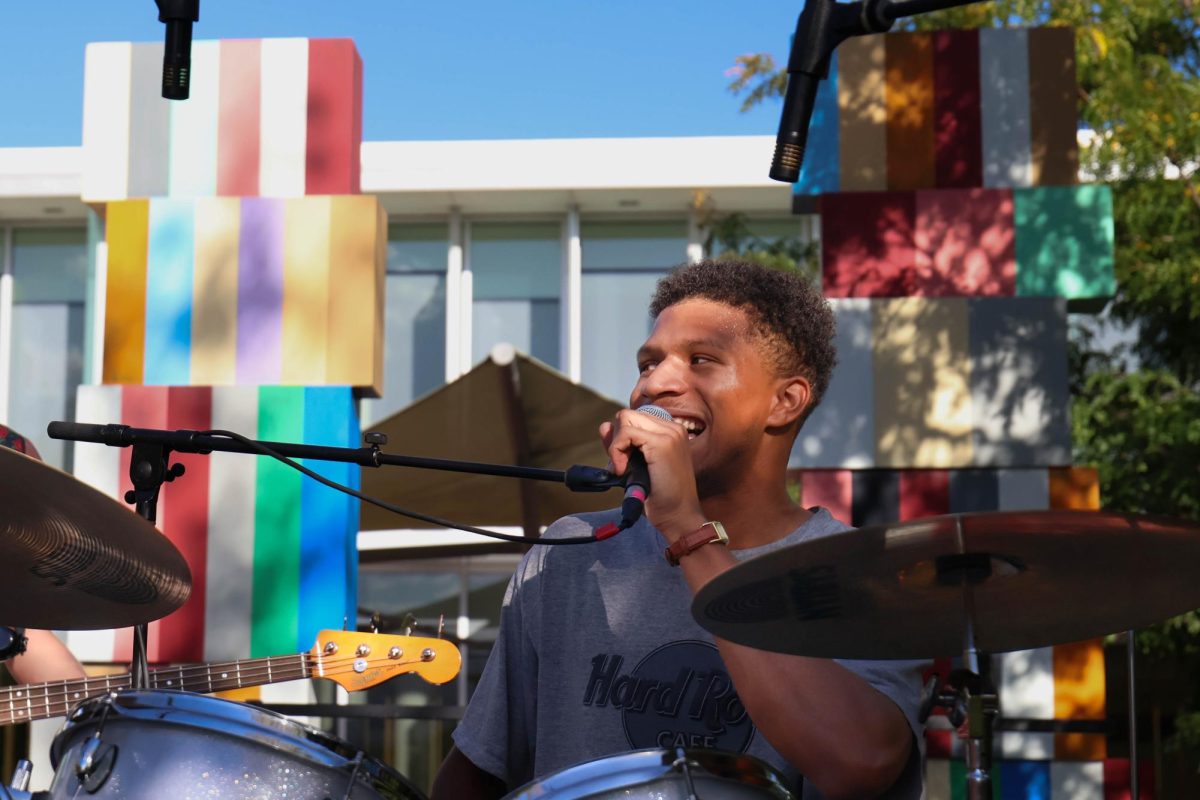 Jordan Upton sings and well as plays drums for local Fort Collins band State Line during Battle of the Bands on Sep. 19. 