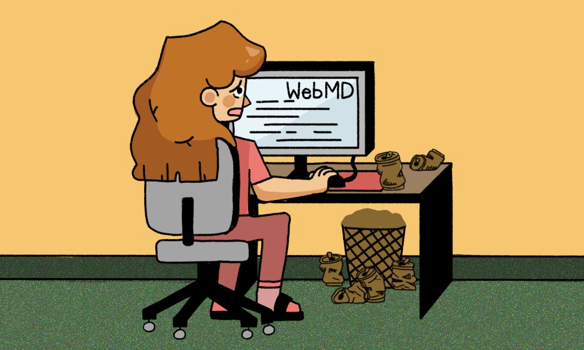 A girl with red hair and a pink outfit sits on a grey desk chair in front of a computer, browsing on the website WebMD. Beside her to the right, there are empty cans overflowing out of a black trash can.