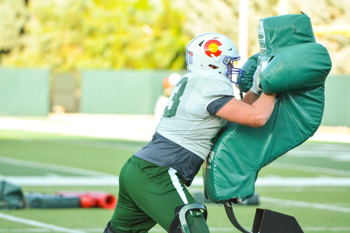CSU linebacker running a drill during morning practice. 