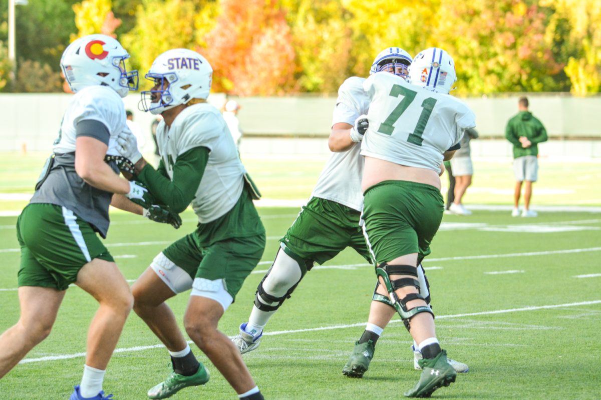 CSU defensive linemen running a drill during morning practice. 