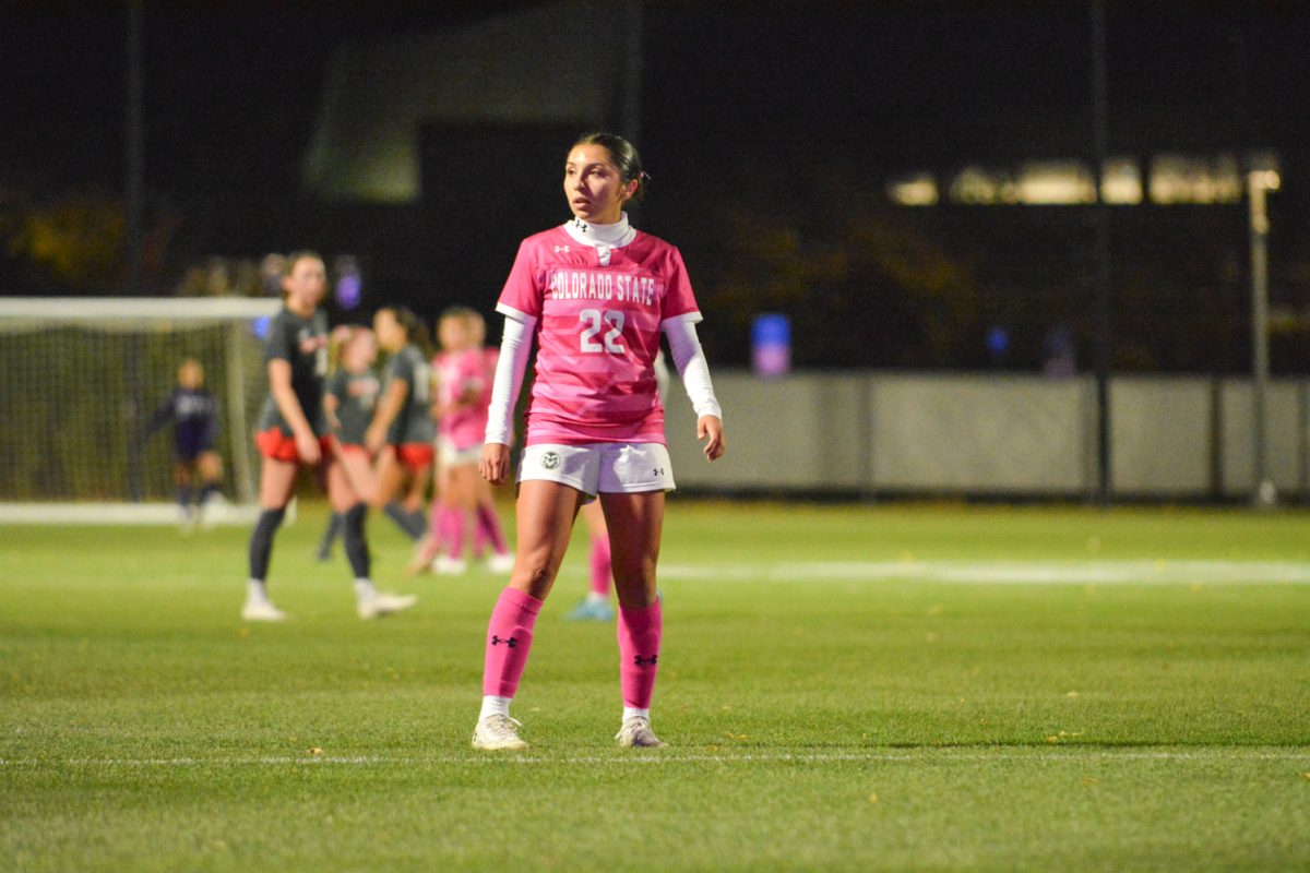 Girl in pink jersey walking