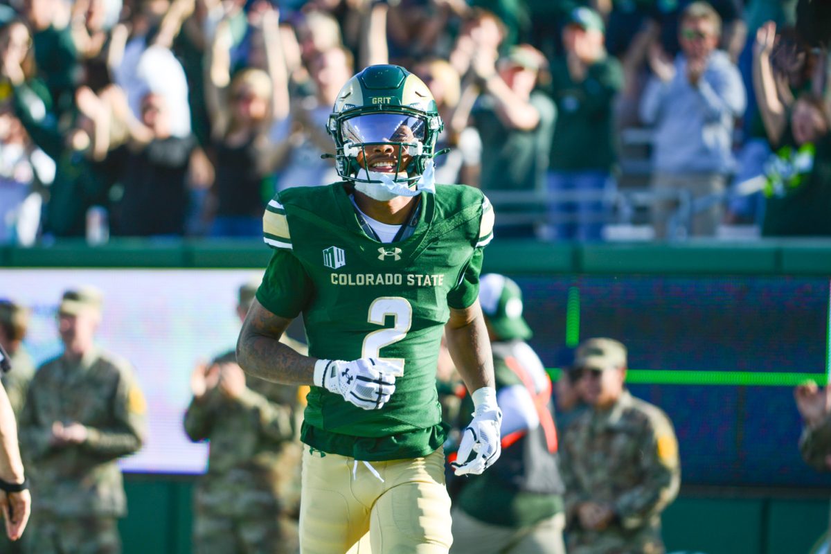 Player in green jersey running