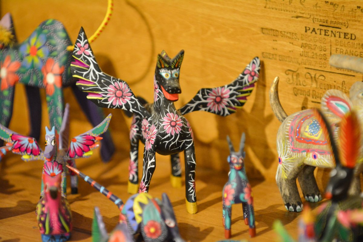 Animal sculptures called “Alebrijes” representing mexican culture during the art exhibit “Street Vistas: Oaxaca’s Dia de Los Muertos” Oct. 4. This exhibit took place at the Global Village Museum of Arts and Cultures.