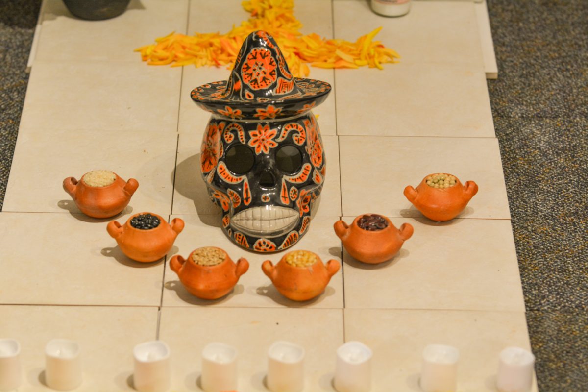 A representation of a grave decorated for the day of the dead Oct.4.  This grave is to represent mexican culture during the art exhibit “Street Vistas: Oaxaca’s Dia de Los Muertos” Oct. 4. This exhibit took place at the Global Village Museum of Arts and Cultures.