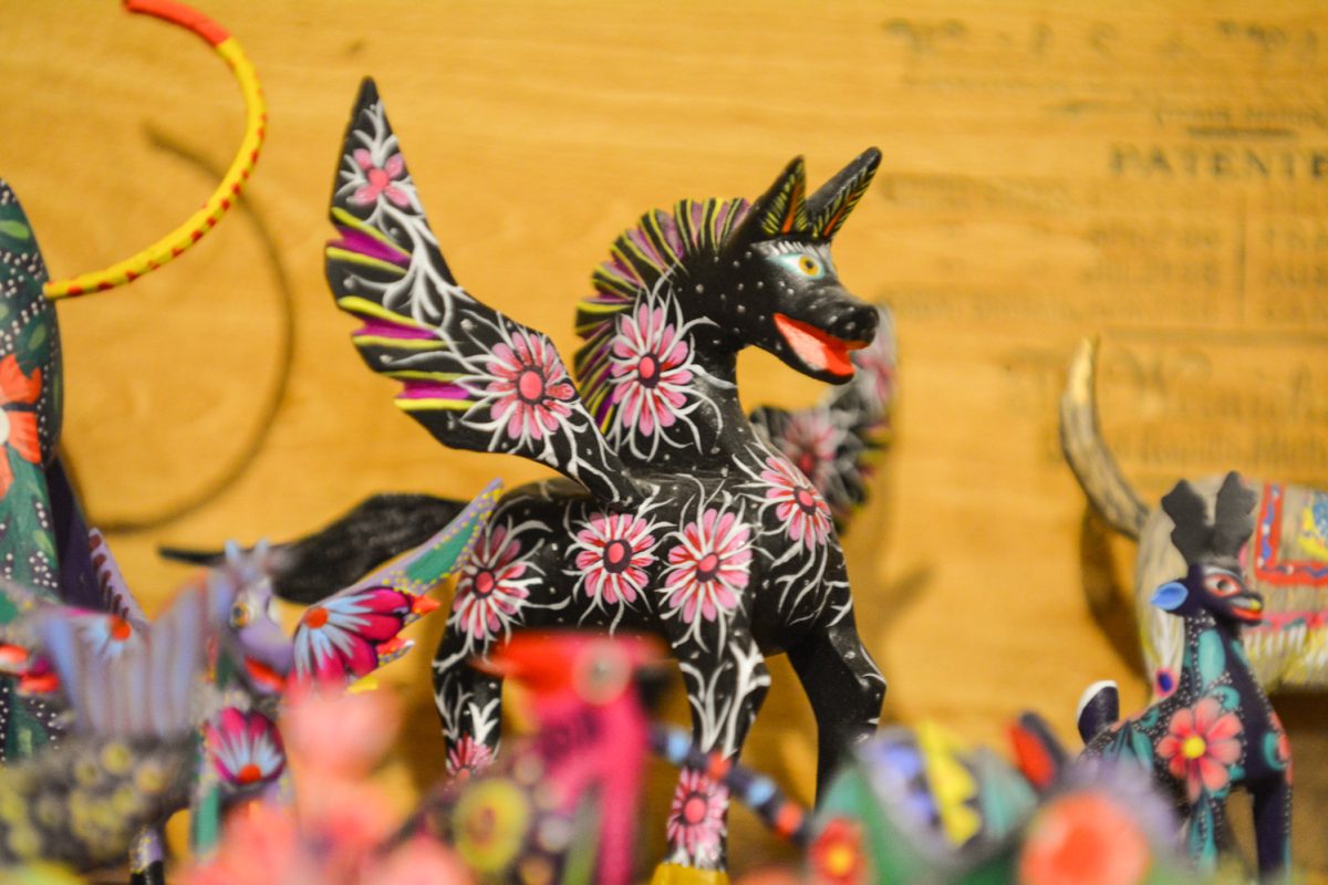 Animal sculptures called “Alebrijes” representing mexican culture during the art exhibit “Street Vistas: Oaxaca’s Dia de Los Muertos” Oct. 4. This exhibit took place at the Global Village Museum of Arts and Cultures.