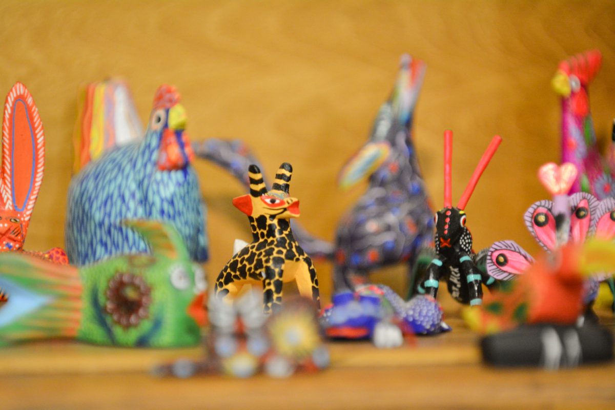 Animal sculptures called “Alebrijes” representing mexican culture during the art exhibit “Street Vistas: Oaxaca’s Dia de Los Muertos” Oct. 4. This exhibit took place at the Global Village Museum of Arts and Cultures.