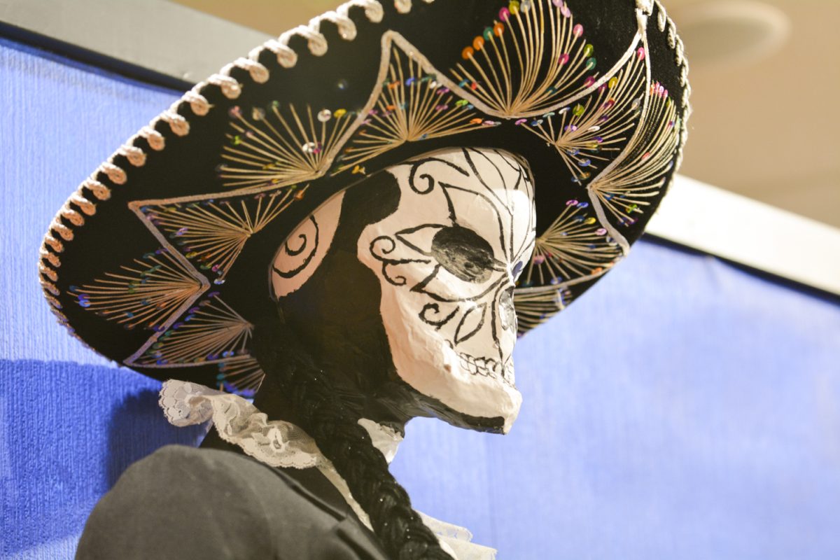 Paper mache skeleton representing mexican culture during the art exhibit “Street Vistas: Oaxaca’s Dia de Los Muertos” Oct. 4. This exhibit took place at the Global Village Museum of Arts and Cultures.