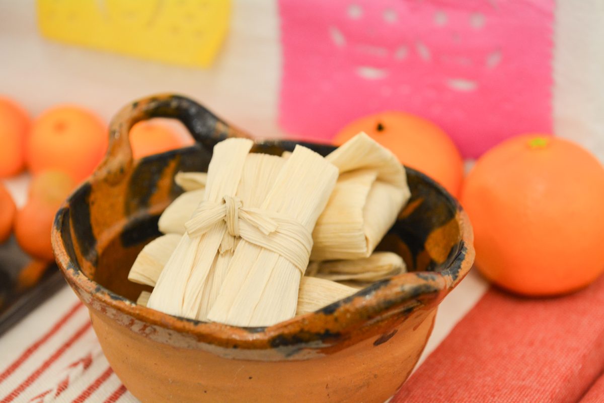 An art piece of tamales, a food that is served during the holiday Oct. 4. This art piece is representing mexican culture during the art exhibit “Street Vistas: Oaxaca’s Dia de Los Muertos." This exhibit took place at the Global Village Museum of Arts and Cultures.