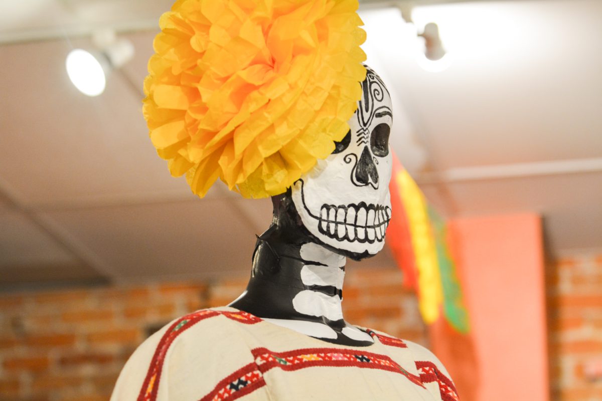 Paper mache skeleton representing mexican culture during the art exhibit “Street Vistas: Oaxaca’s Dia de Los Muertos” Oct. 4. This exhibit took place at the Global Village Museum of Arts and Cultures.