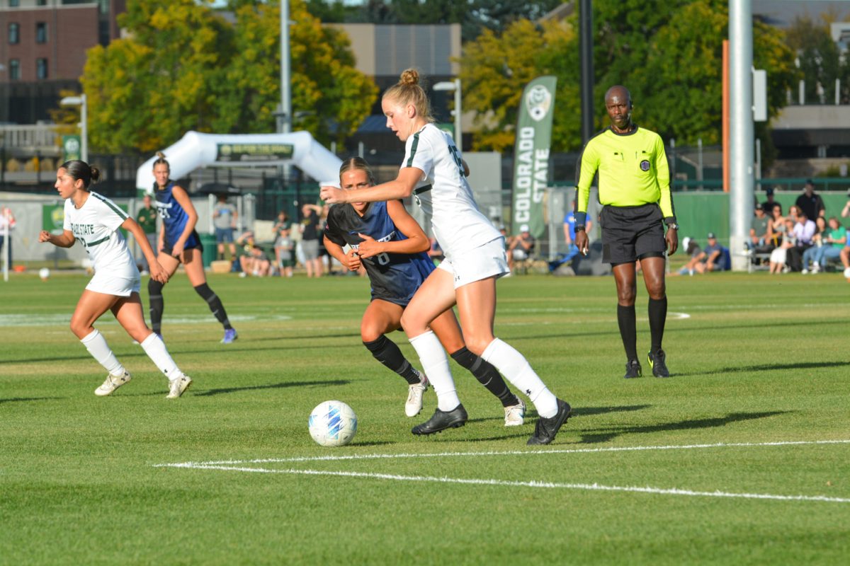 Avery Vander Ven (#15) fighting for the ball against a Boise State player Oct 10. Colorado State University ties with Boise State 1-1.
