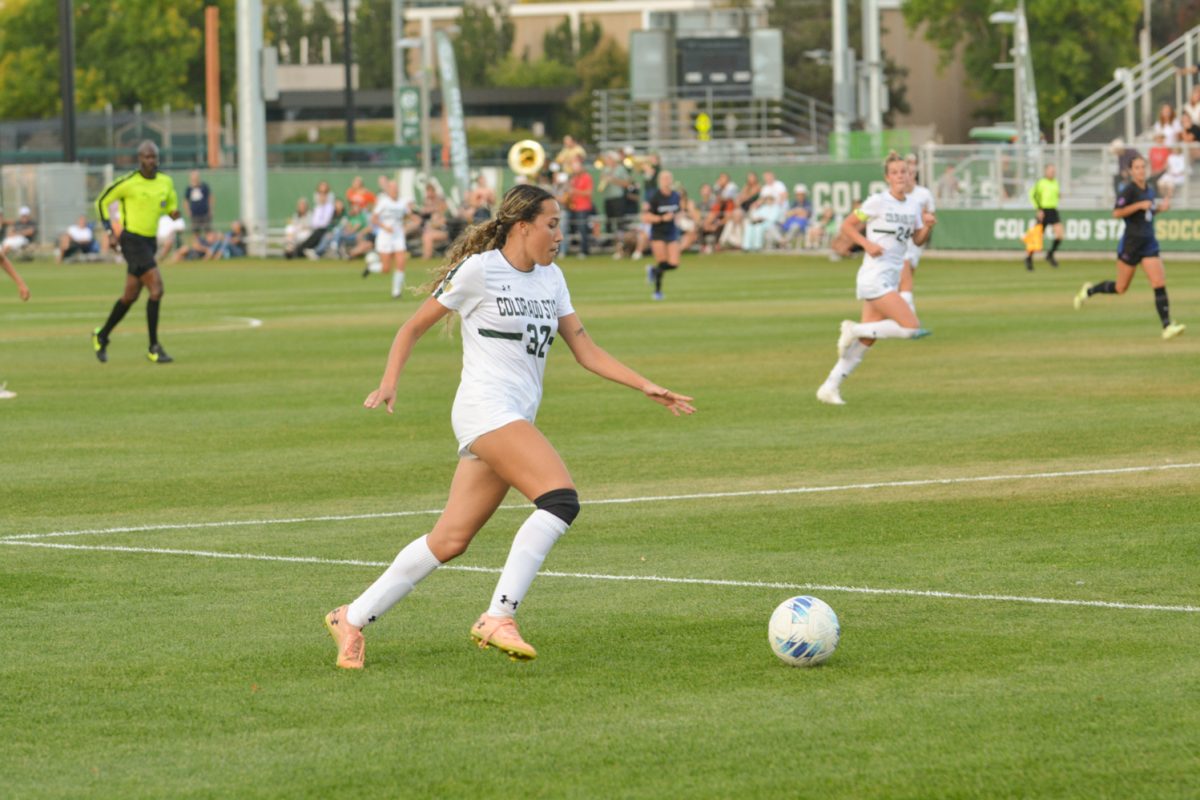 Kaja Dionne (#32) running with the ball looking for a teammate to pass to Oct. 10. Colorado State University ties with Boise State 1-1.