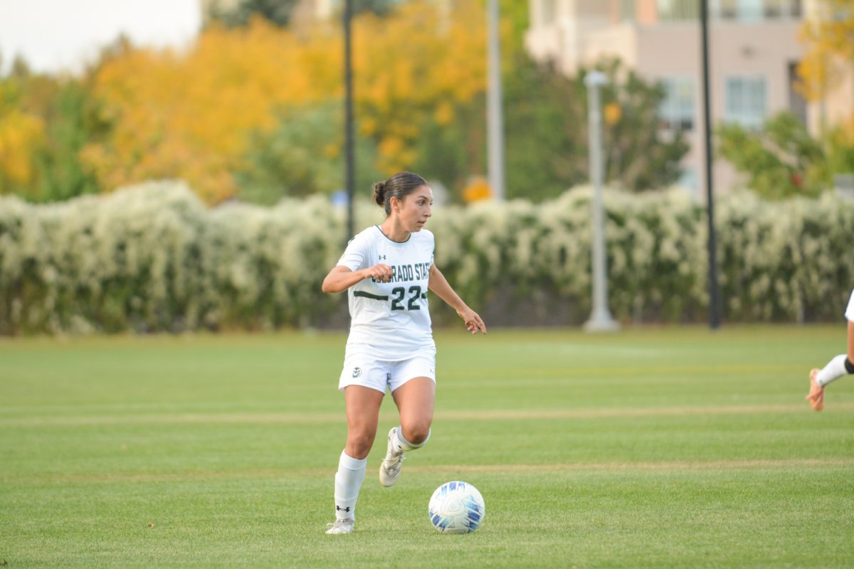 Mia Casey (#22) running with the ball Oct. 10. Colorado State University ties with Boise State 1-1.
