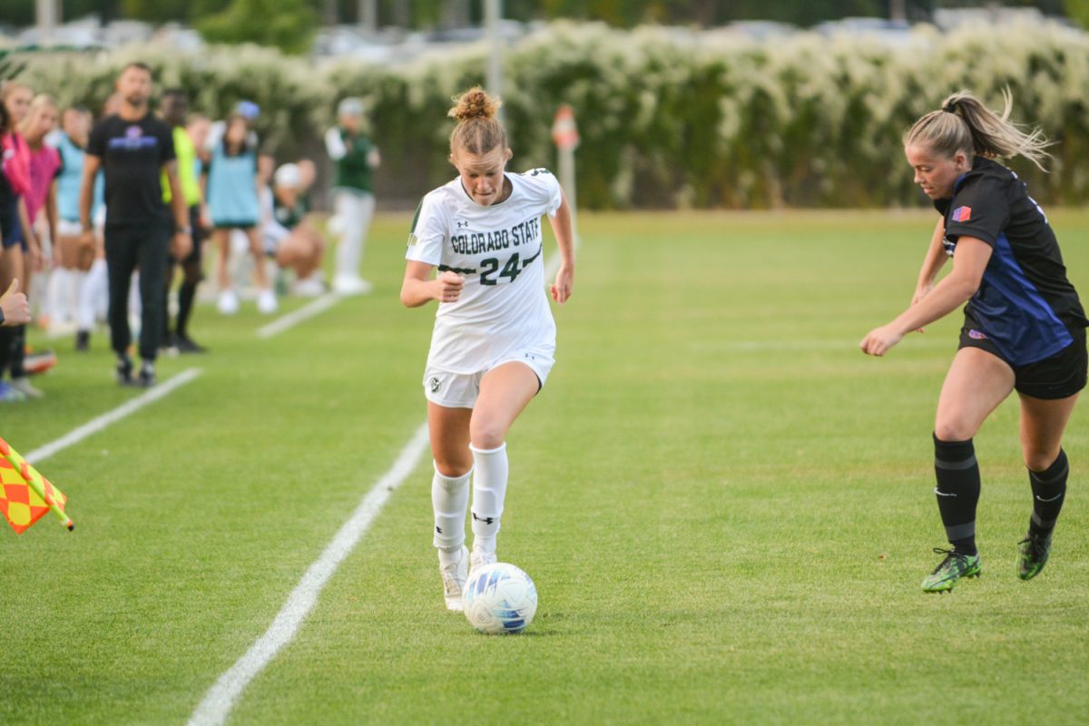 Maggie Altman (#24) running with the ball trying to get away from a Boise State player Oct. 10. Colorado State University ties with Boise State 1-1.