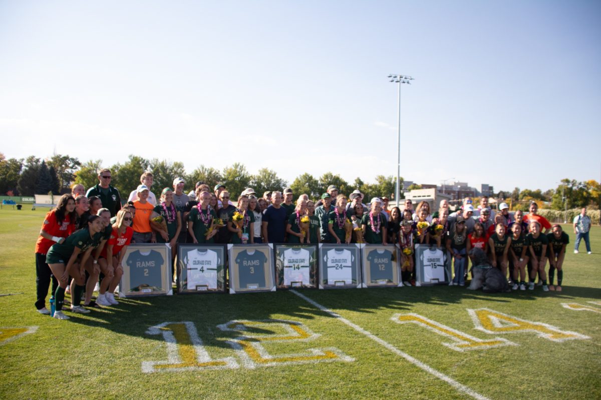 The Colorado State University womens soccer team poses with coaches and family members for senior night Oct 13. The Rams tied with the Utah State Aggies 1-1.