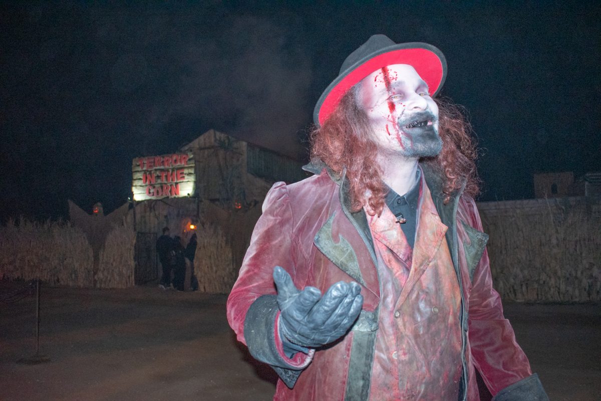 A person dressed as a scary almost-clown.