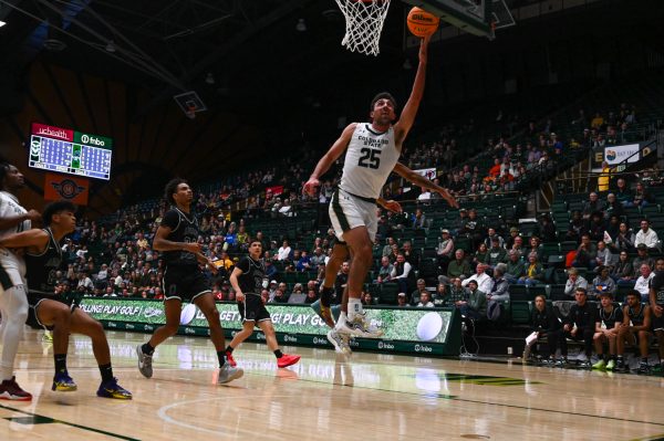 Ethan Morton shoots and scores during the Colorado State University vs. Adams State University basketball game. Oct. 30, 2024. (CSU won 90-72)