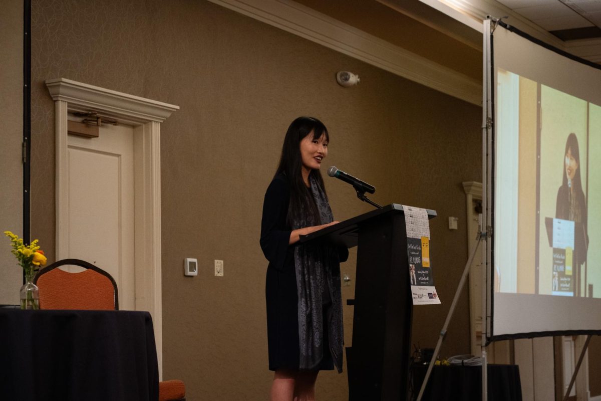 Author Rebecca F. Kuang discusses her books and experience in the literary field at the Fort Collins Marriott Oct. 27. "I just had to create space for myself on the bookshelf," Kuang said in relation to representation from women of color in the literary industry. 