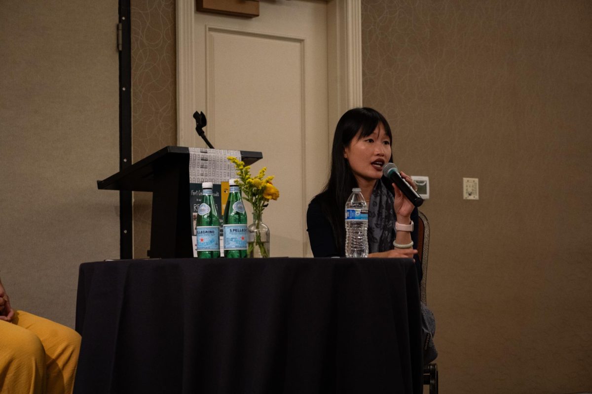 Author Rebecca F. Kuang takes audience questions with Teresa Steele, Fort Collins Reads Reads Committee Co-Chair. Kuang spoke about her work and journey as an author at the Fort Collins Marriott Oct. 27 followed by a book signing. 