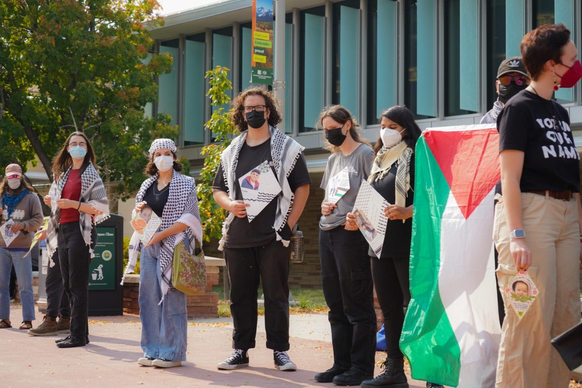 Members of Students for Justice Palestine on The Plaza Oct. 7 take part in the Walk Out For Palestine demonstration. The demonstration was organized to mark one year since the start of the Israel-Hamas war. 