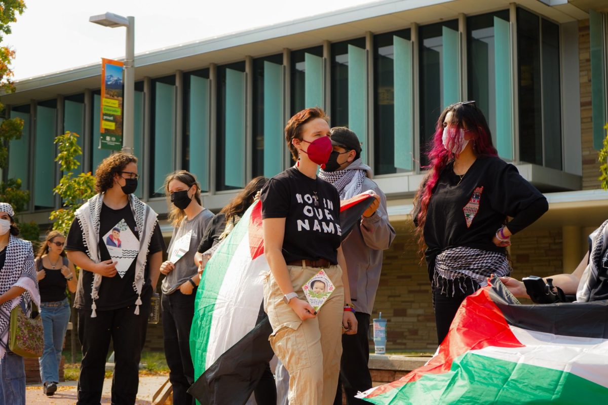 Ella Smith and other members of Students for Justice Palestine on The Plaza Oct. 7 take part in the Walk Out For Palestine demonstration. The demonstration was organized to mark one year since the start of the Israel-Hamas war. 