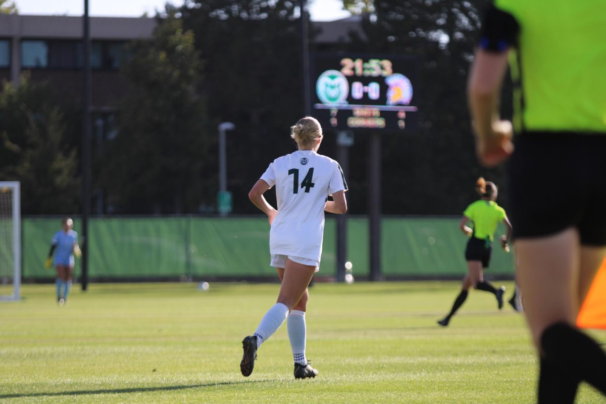Colorado State mid-fielder, Katy Coffin (14), heads towards the play Oct. 3.