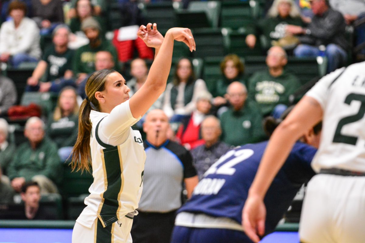 A player in a green and white jersey after a free throw