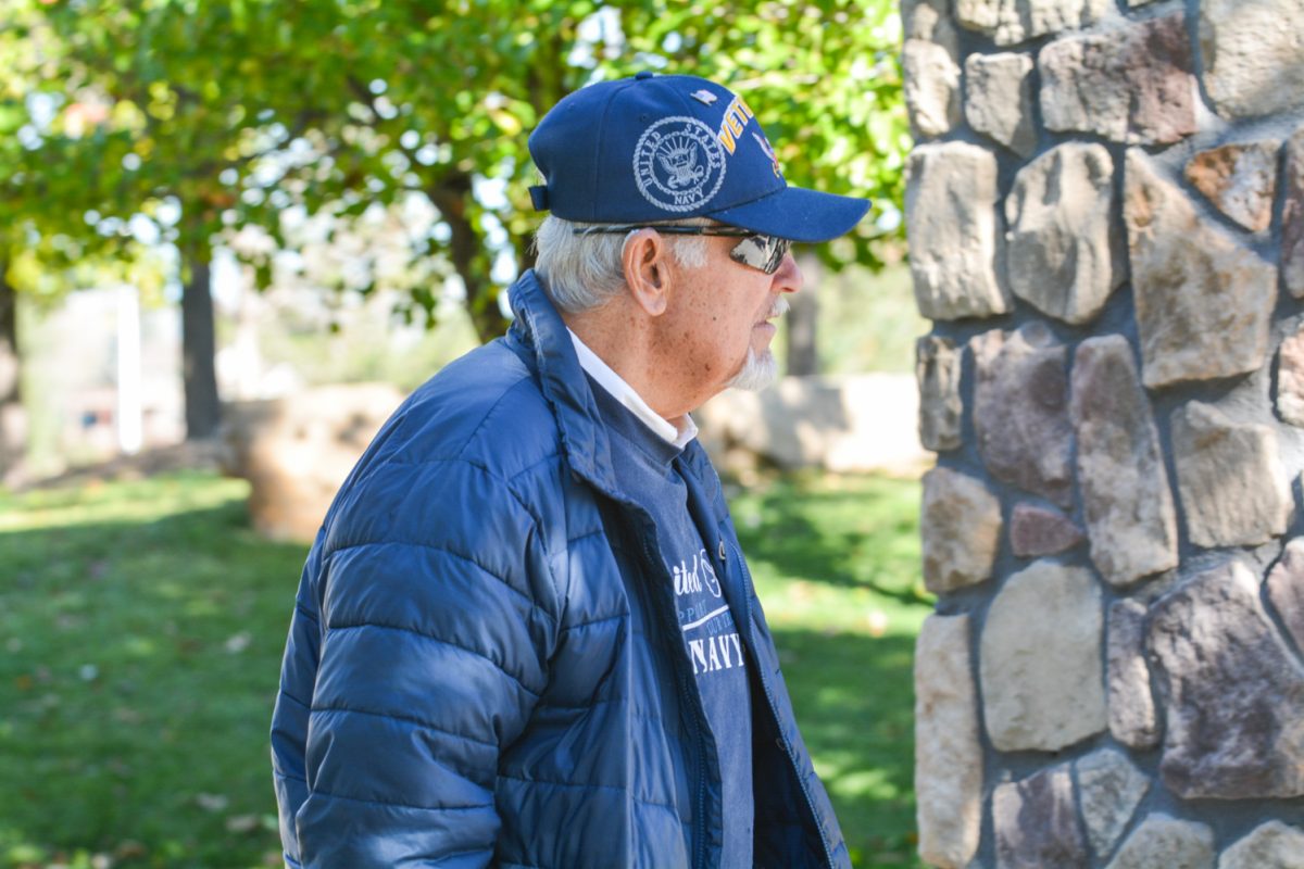 Steve Jetter admiring the screen of past veterans at the Veterans Plaza on Veterans Day Nov. 11. This screen is located at Spring Canyon Community Park.