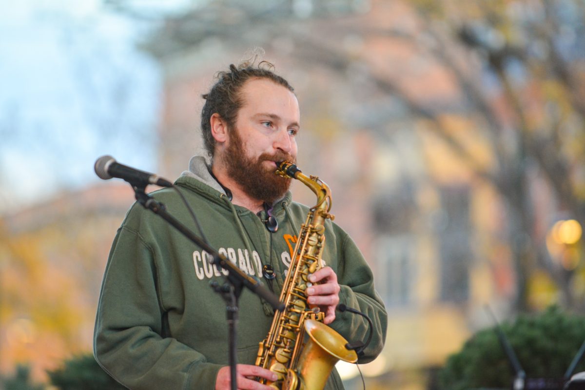 A man playing a saxophone