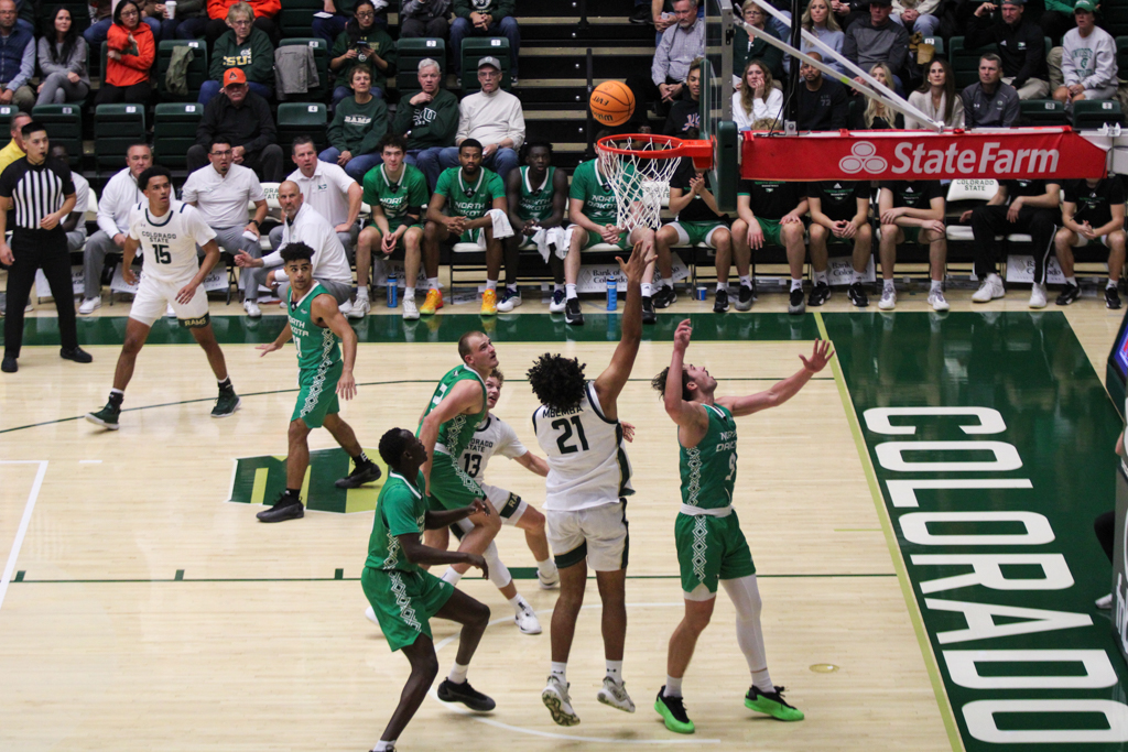 Rashaan Mbemba (21) shoots a two-pointer.