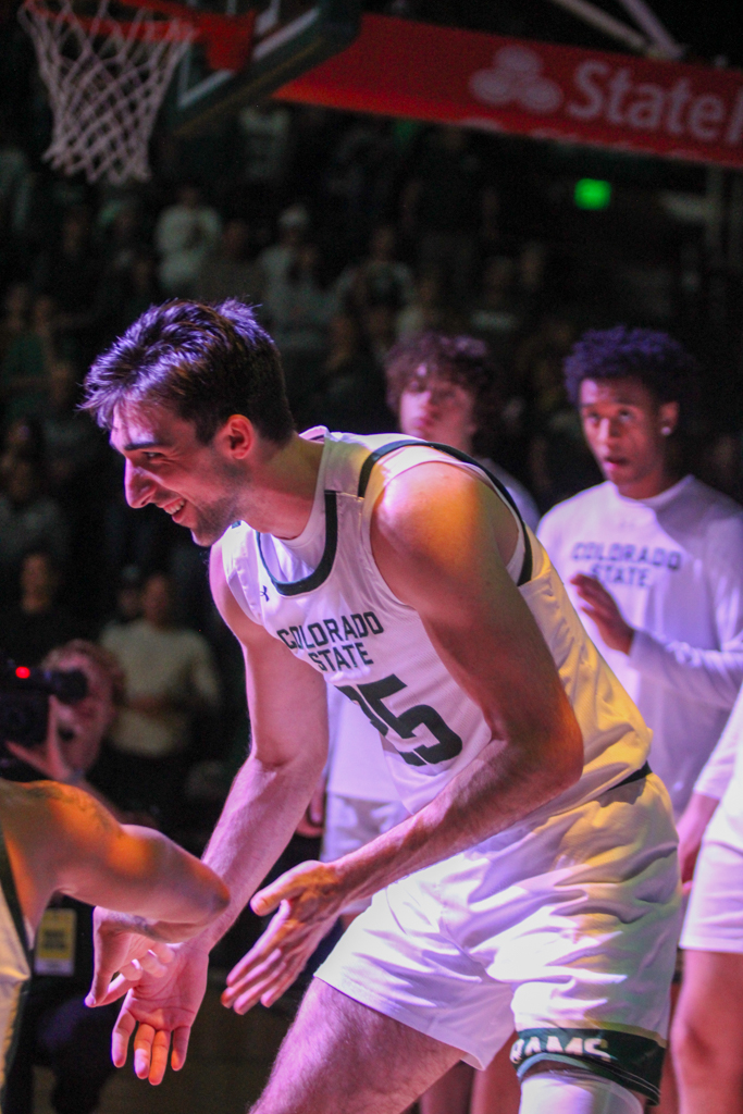 Kyan Evans (0), a Colorado State guard, is announced as a starter for CSU basketball.