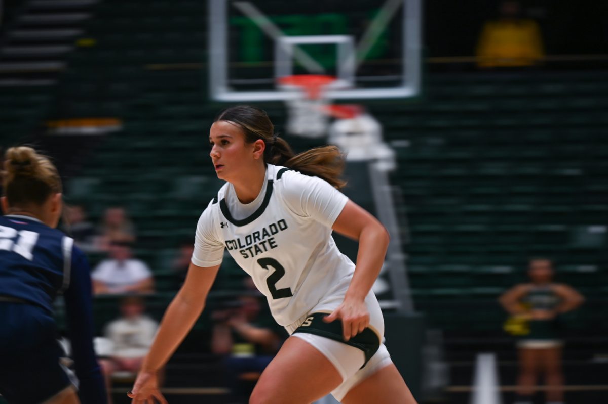 Brooke Carlson dribbles across the court during the Colorado State University vs. Columbia College basketball game Nov. 16. CSU won 85-28.