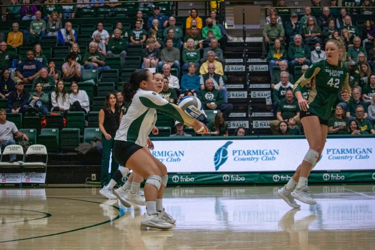 A volleyball player passes the ball.