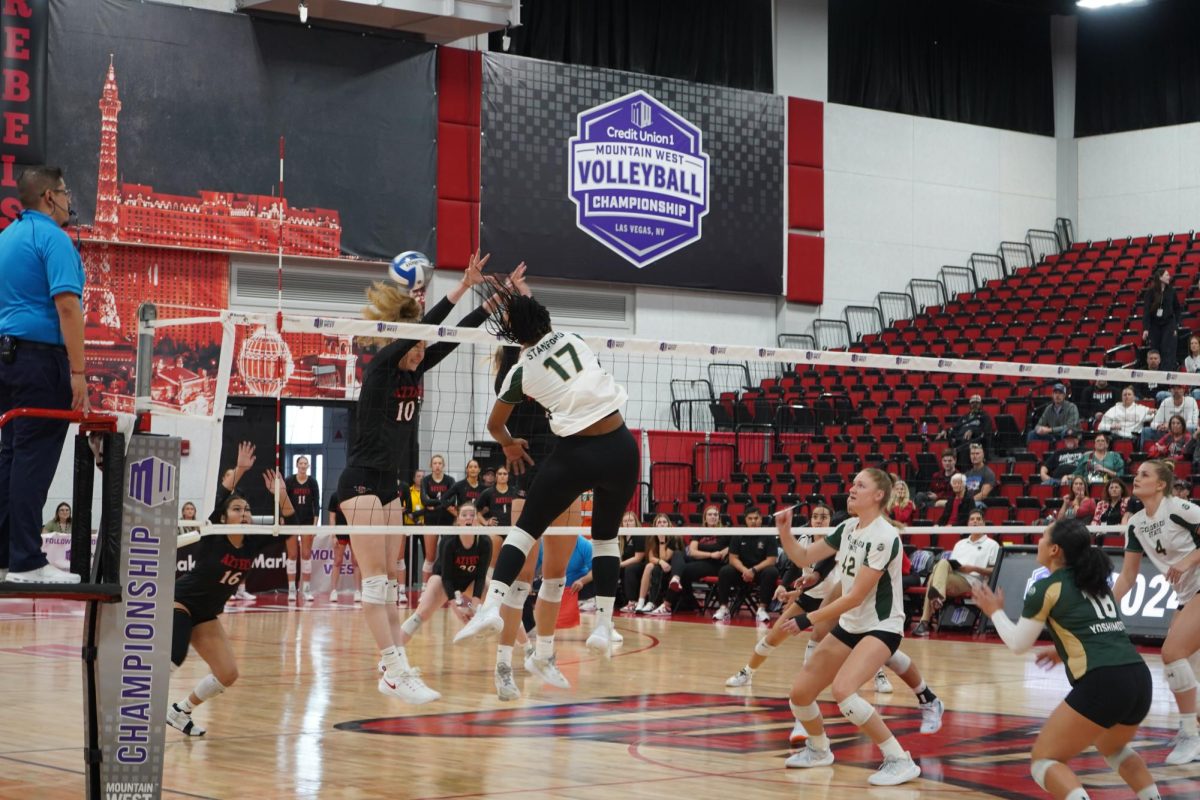 Kennedy Stanford (17) attacks the ball during game Nov. 29. Colorado State volleyball beat San Diego State 3-1. 