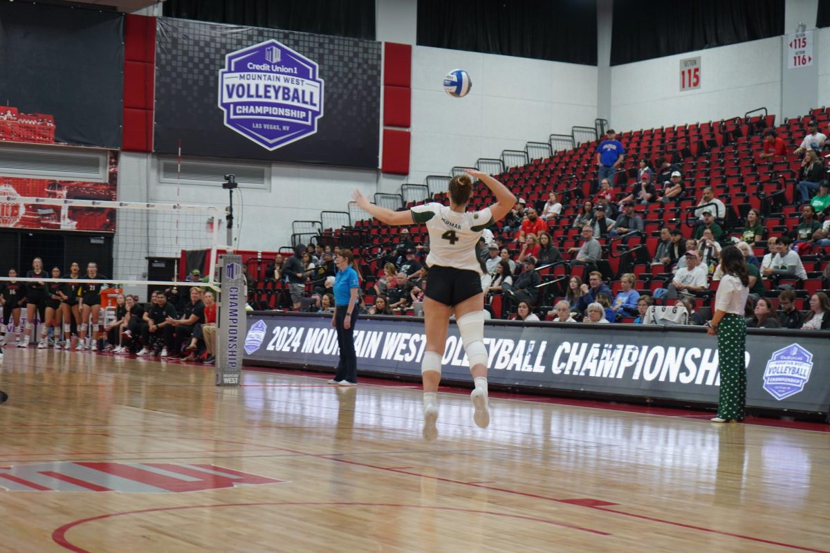 Emery Herman (4) serves the ball against San Diego State Nov. 29. The Rams won 3-1. 