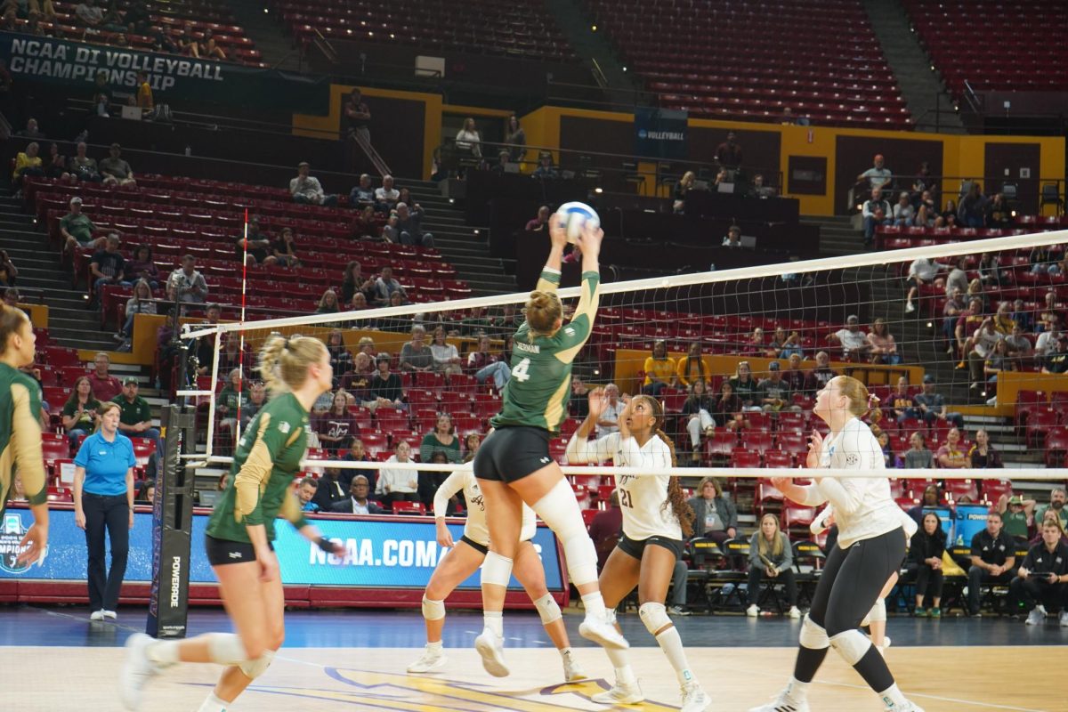 Emery Herman (4) dumping the ball in game against Texas A&M Dec 6. Colorado State volleyball lost 1-3 in first round of NCAA tournament.